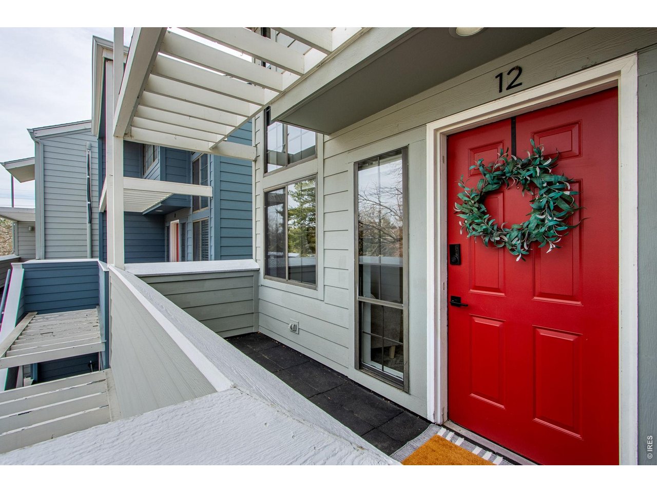 Outdoor living is enjoyed from both from the front porch and back balcony!