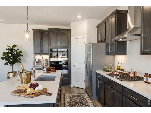 Property Photo 6 Chef's kitchen including appliances and modern finishes