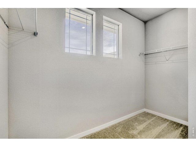 Property Photo 13 Primary walk-in closet