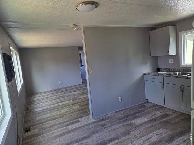 Property Photo 14 Living Room & Kitchen