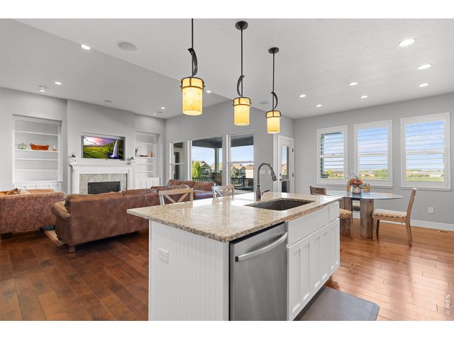 Property Photo 12 Open floor plan with tall ceilings