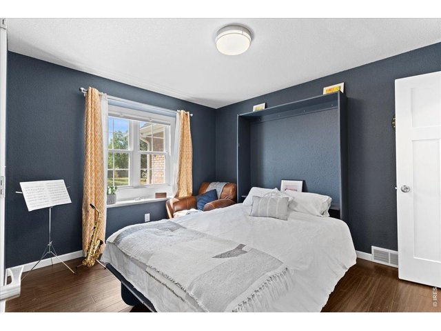 Property Photo 15 Main floor Den with Murphy Bed