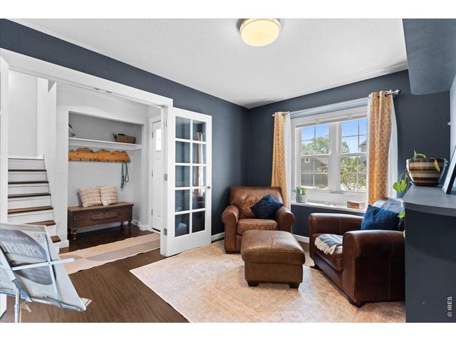Property Photo 13 Main Floor Den with Murphy Bed