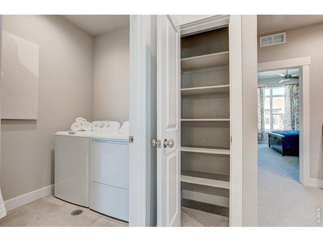 Property Photo 20 Linen closet conveniently located by the laundry room. Photos of a previously built Barrington II. 
