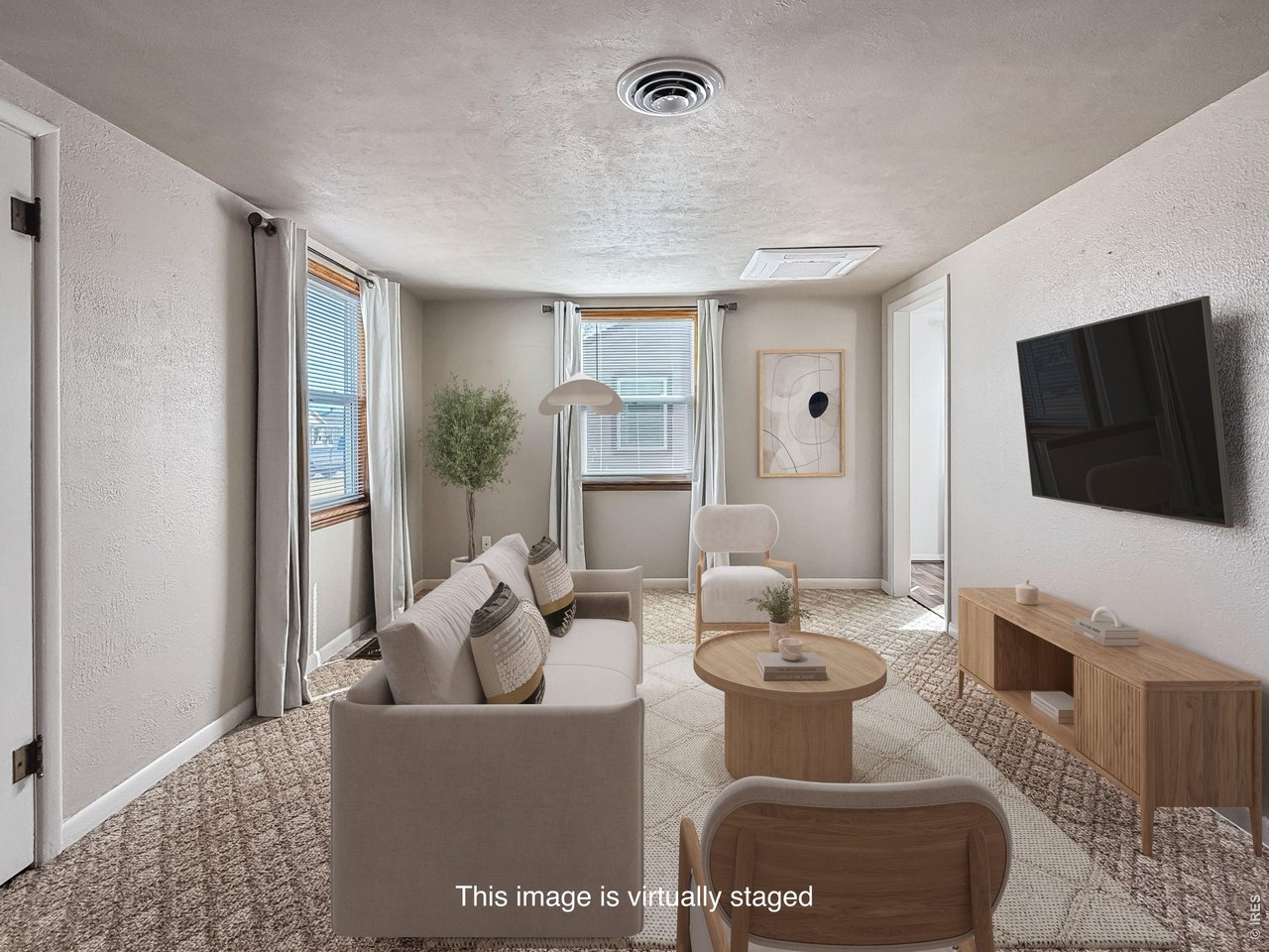 Photo virtually enhanced to show possible furniture placement
