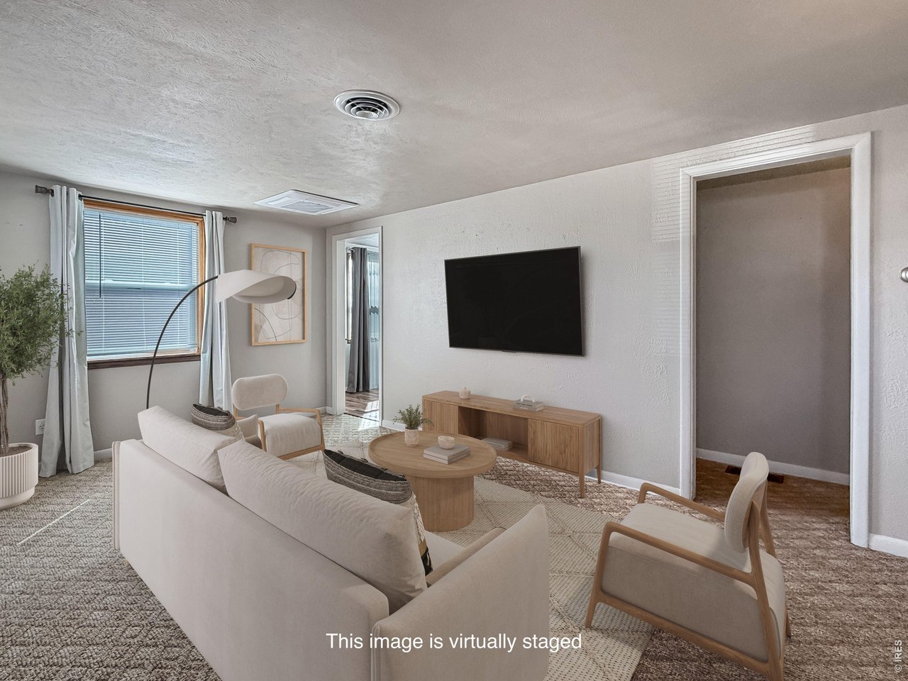 Photo virtually enhanced to show possible furniture placement