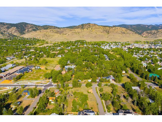 Property Photo 7 Positioned toward the quieter southwest end of Vine Avenue, the property offers a peaceful residential setting with Flatiron views and immediate access to many of North Boulder's most sought-after amenities.