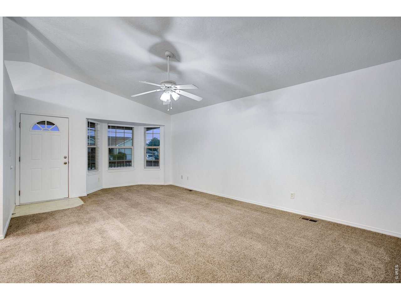 Large front living room with bay window 