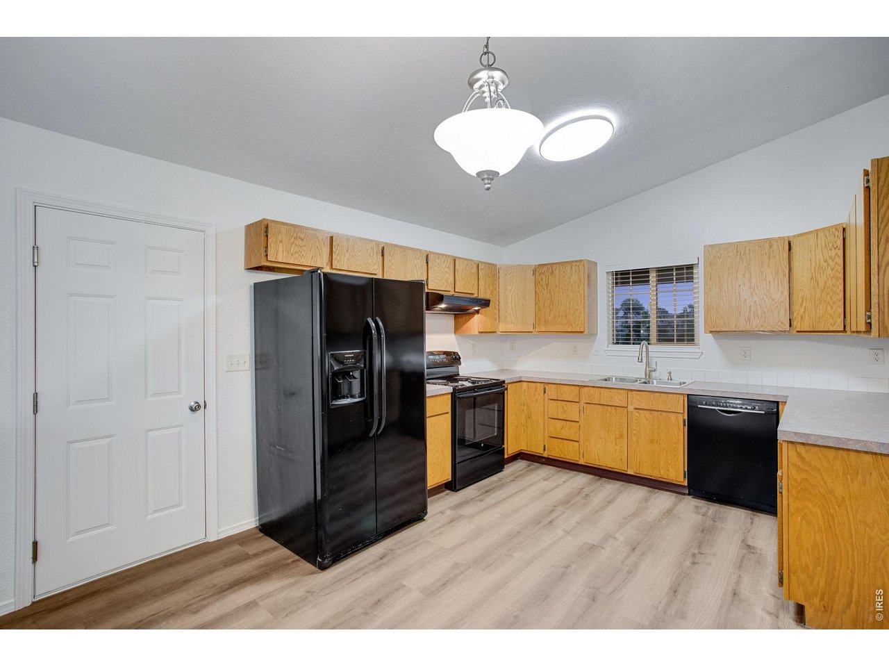 Cozy kitchen featuring plenty of counterspace and cabinets plus all appliances which are included 