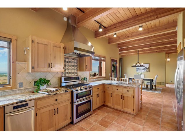 Property Photo 8 Stainless appliances including gas range/double oven! 