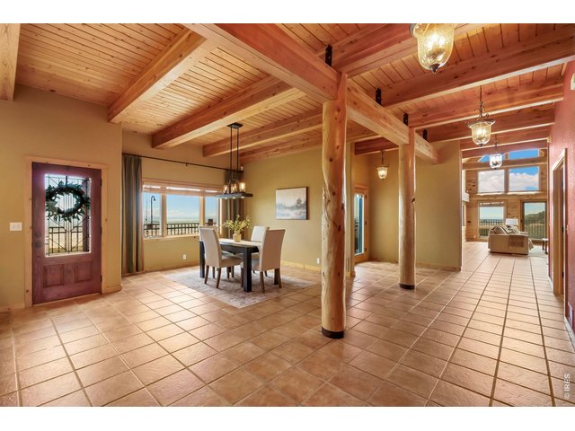 Property Photo 10 Open design from kitchen, through dining area, and into family room! 