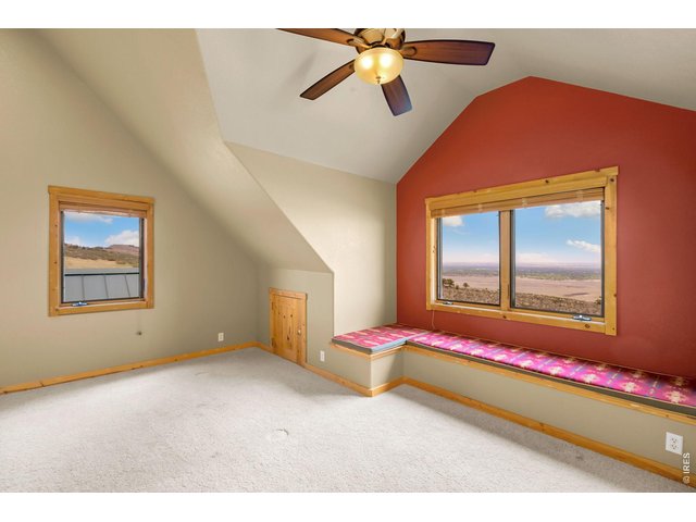 Property Photo 24 Second bedroom on second floor with window bench & more views! 