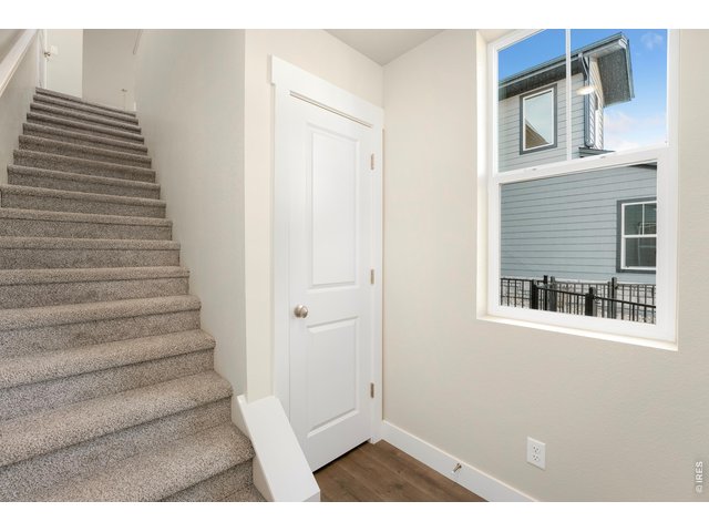 Property Photo 19 Stairs from your detached garage to ranch style living!