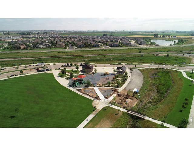 Property Photo 26 Community park with playground, pickleball, basketball and dog park. 