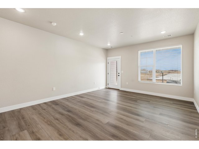 Property Photo 7 Extended luxury vinyl into living room