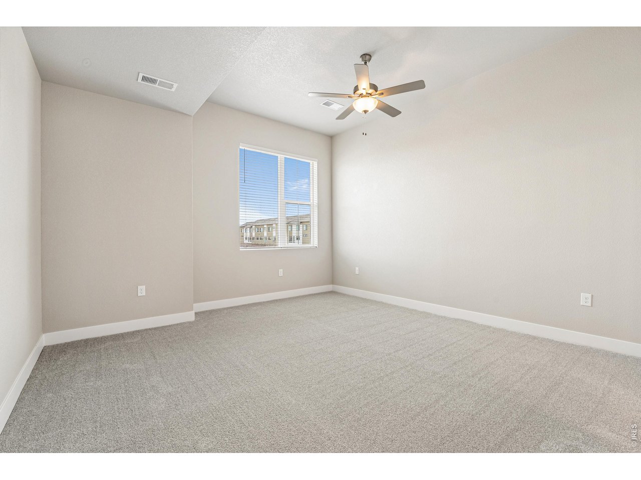 Property Photo 15 Second bedroom with ceiling fan included. 