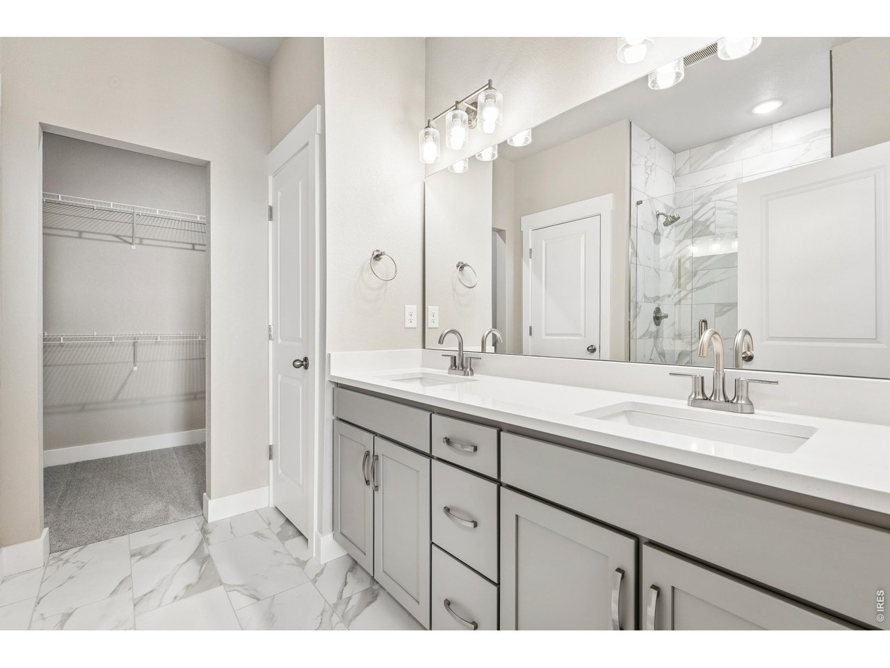 Property Photo 13 Primary bathroom with dual vanities