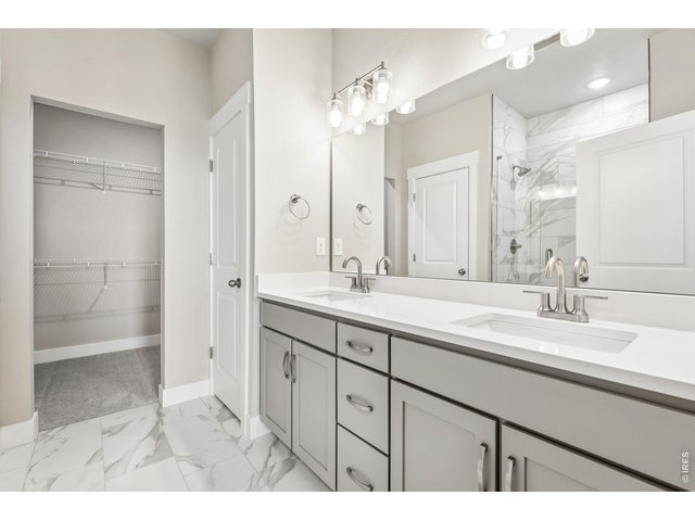 Property Photo 13 Primary bathroom with dual vanities