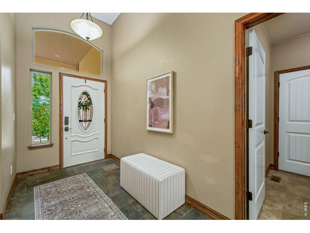 Property Photo 5 Bright entryway with slate flooring
