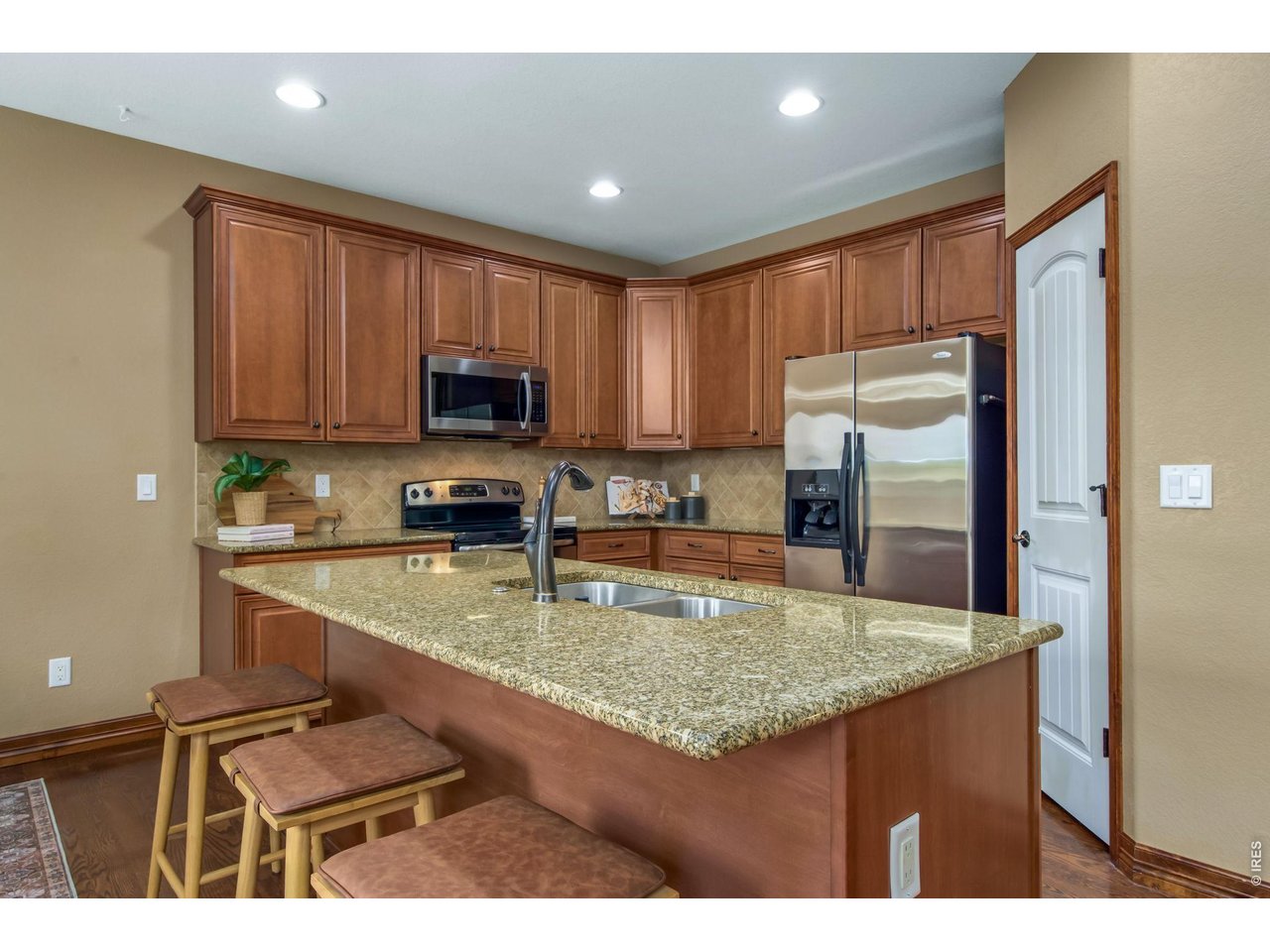 Warm kitchen with ample cabinet space