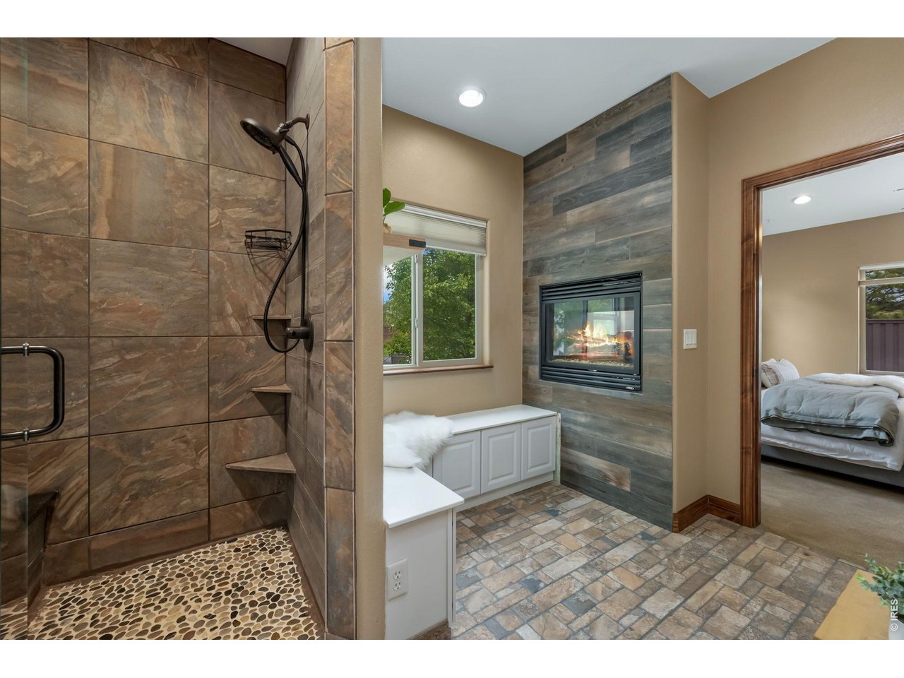 Custom shower with stone floor