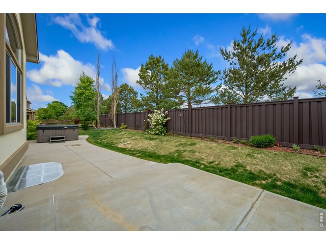Property Photo 34 Mature trees behind the fence for added privacy