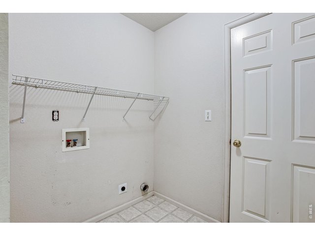 Property Photo 16 Main Floor Laundry and Access to Garage