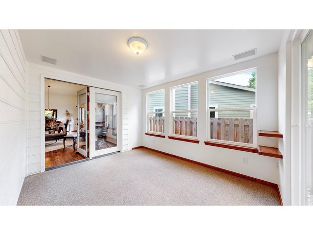 Property Photo 18 Sunroom