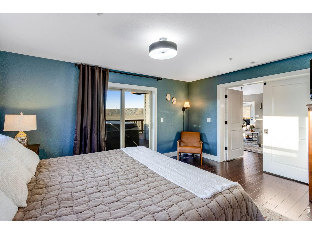 Primary bedroom features a private 3/4 bath and walk-in closet