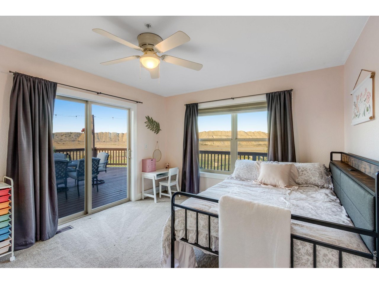 2nd bedroom, in-law quarters or guest suite on main level features patio access 