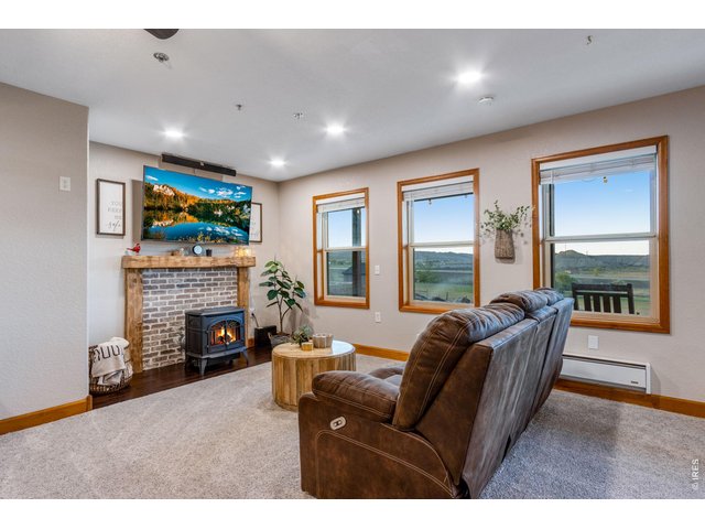 Property Photo 40 Walk-out basement features a pellet stove 