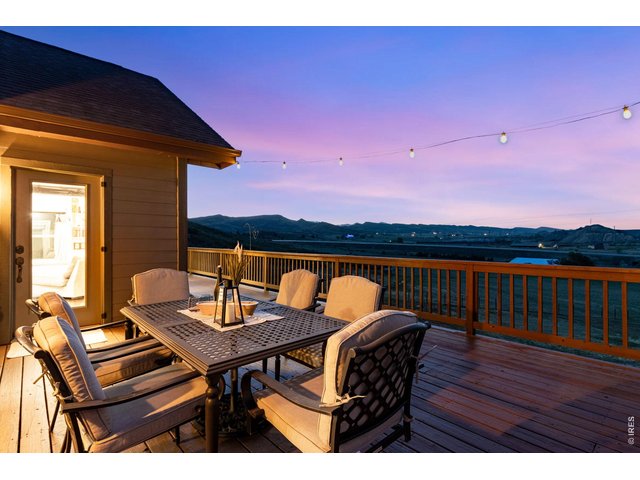 Property Photo 11 Star gaze and relax on the oversized main floor wraparound patio