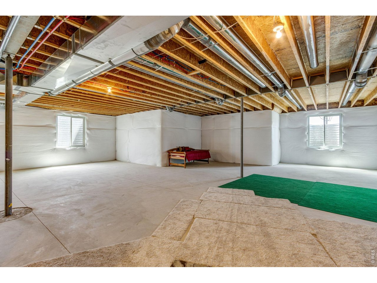 Full unfinished basement w/ 9' ceilings and additional bathroom rough-in. Tankless water heater!