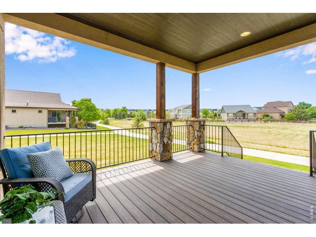 Property Photo 34 Covered deck facing west for wonderful evening sunsets