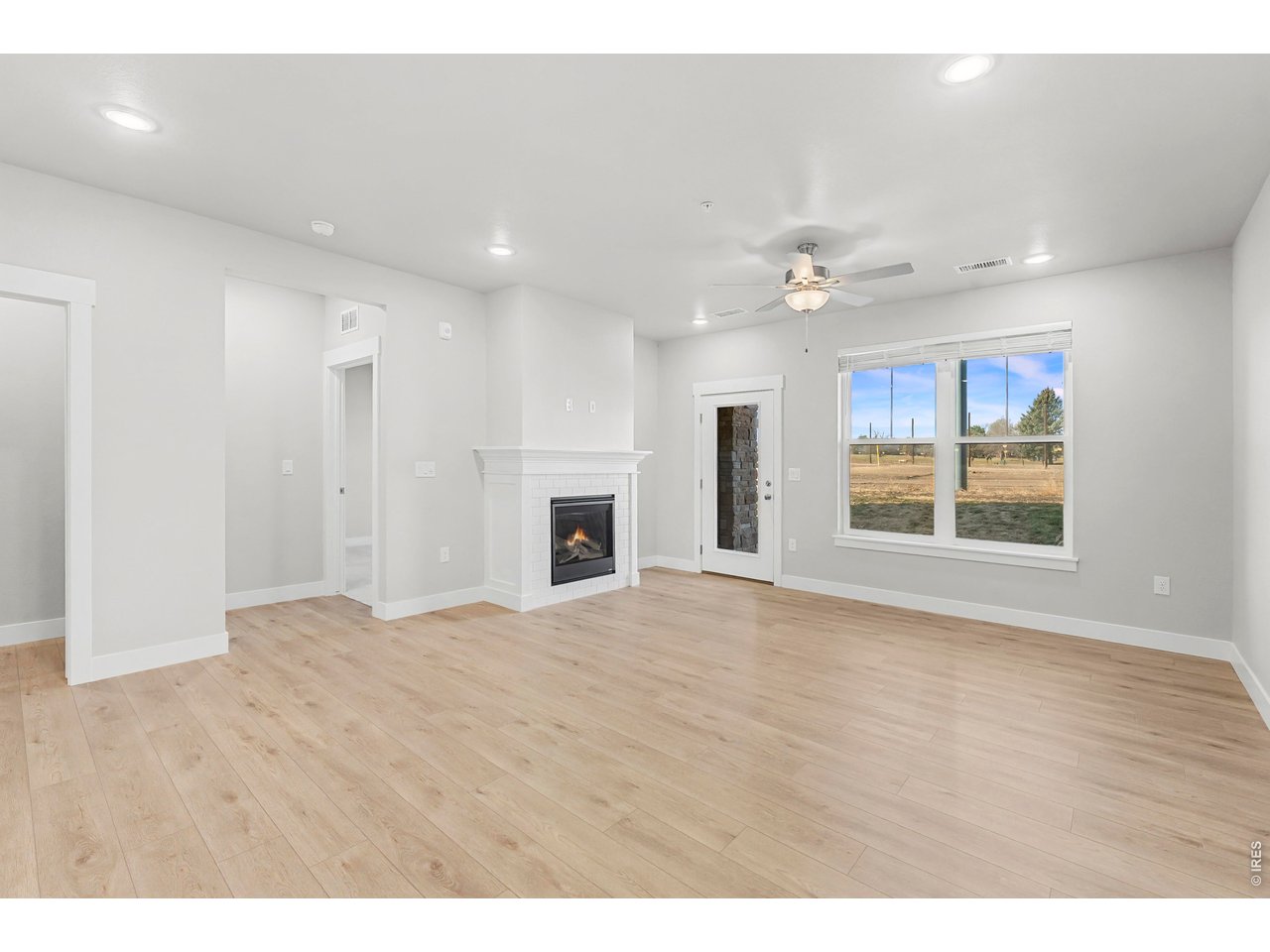 Property Photo 5 Gorgeous, open floor plan with luxury vinyl extended into living room.