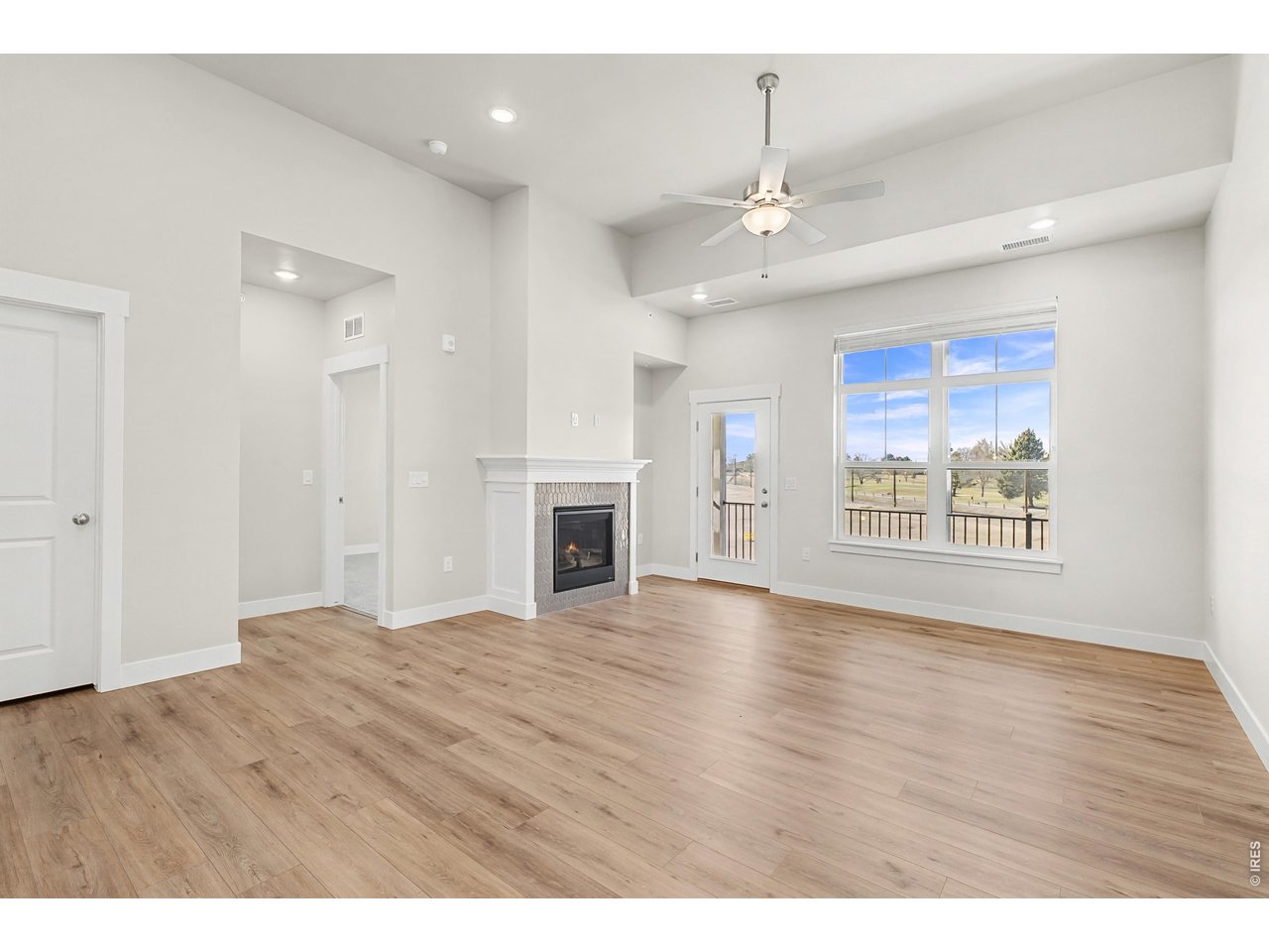 Property Photo 7 Fireplace and ceiling fan included! 