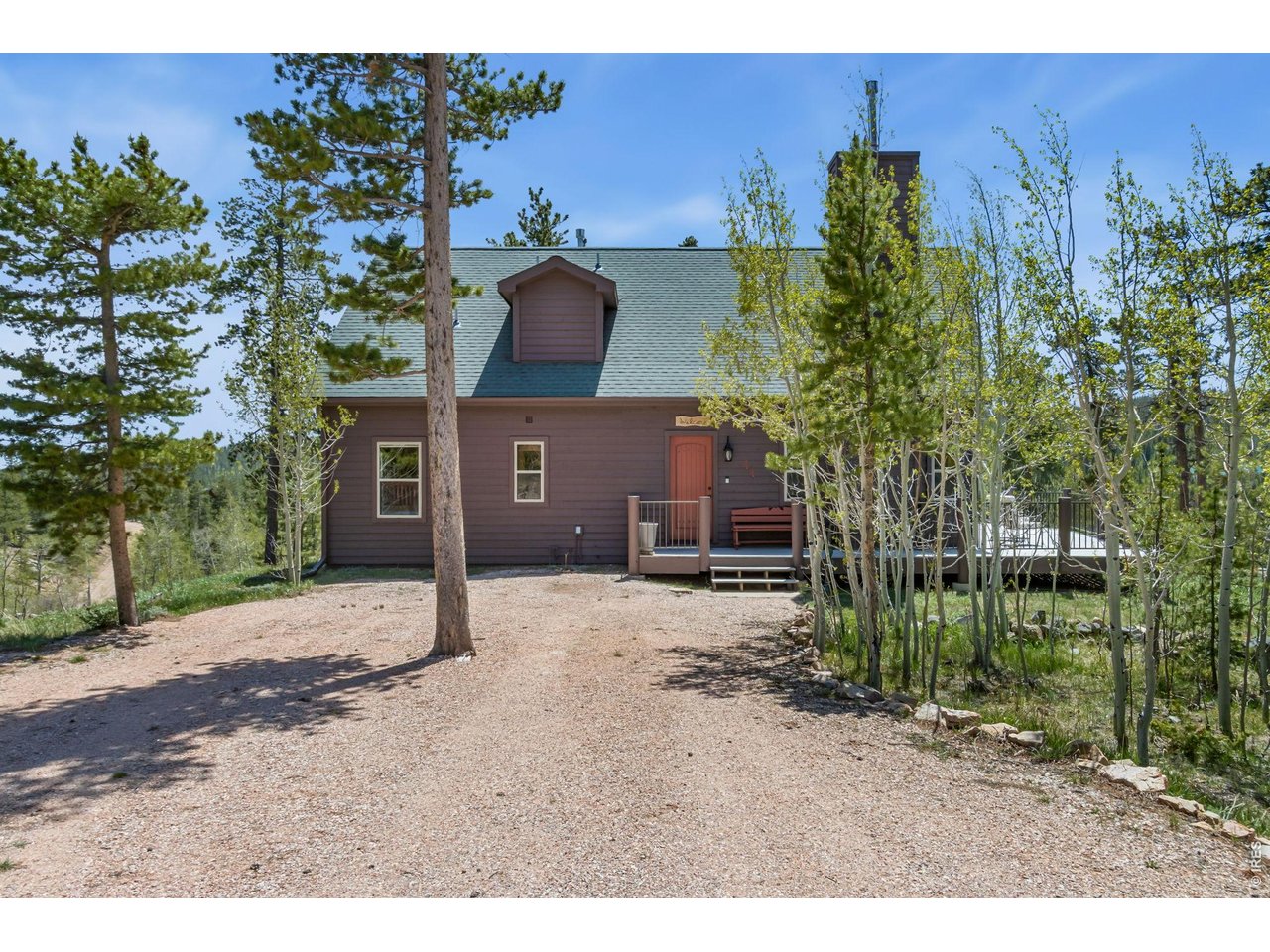 Drive on up and let's take you inside! Don't miss the aspen grove on your right!