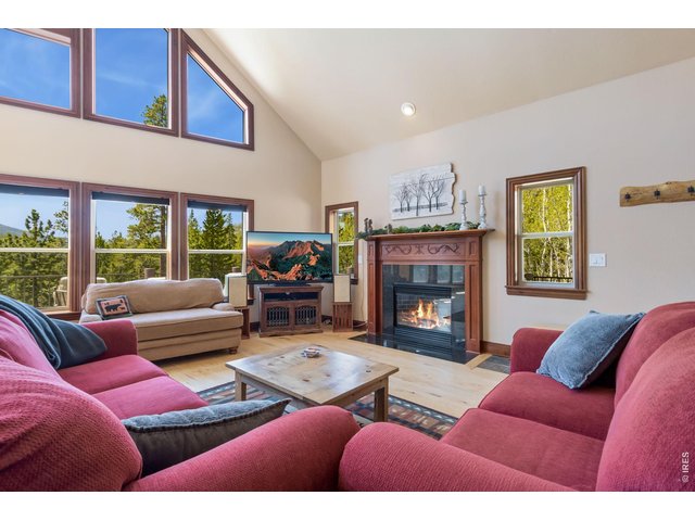 Property Photo 7 Cozy gas fireplace and comfy seating