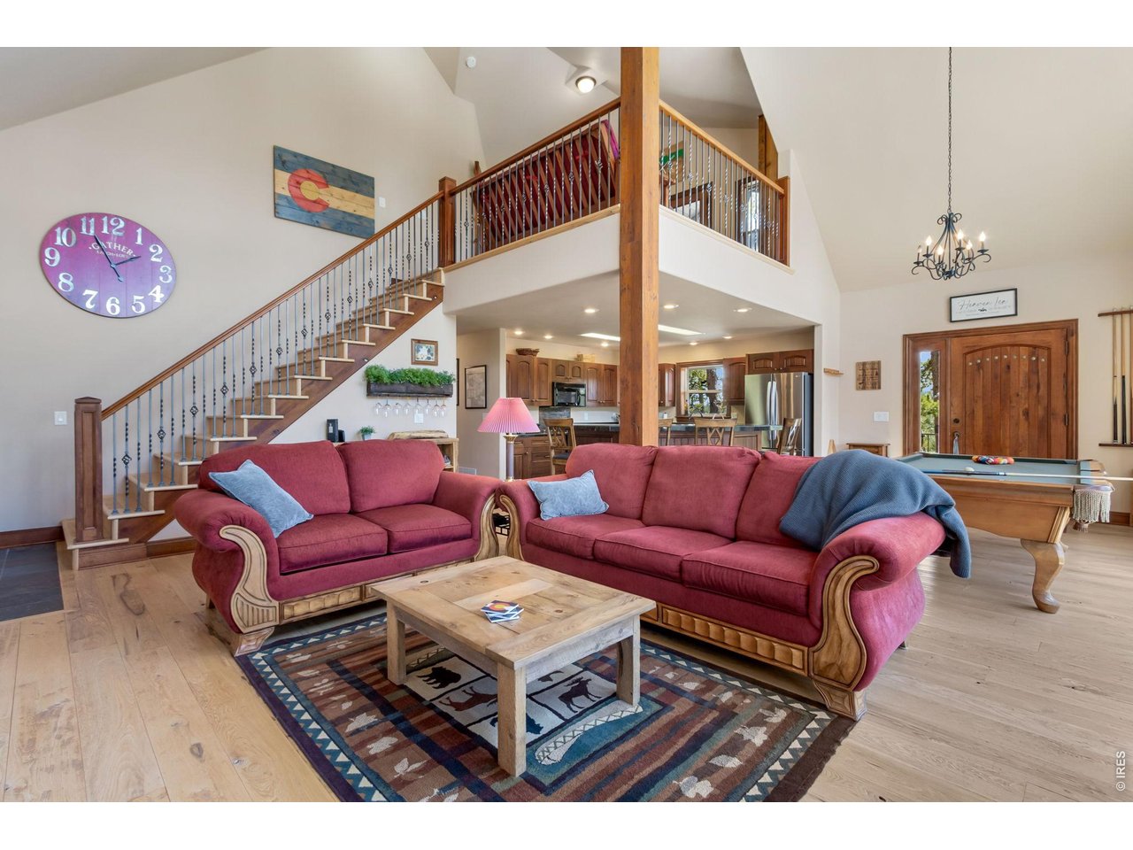 Now that you've toured the downstairs, let's head up to the loft and primary bedroom. 