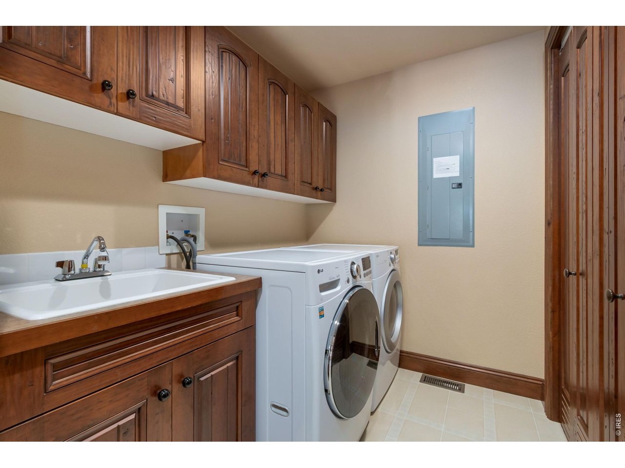 Main level laundry room. Ample storage, a utility sink and a closet with water heater and new furnace. Washer & Dryer included! You are set!