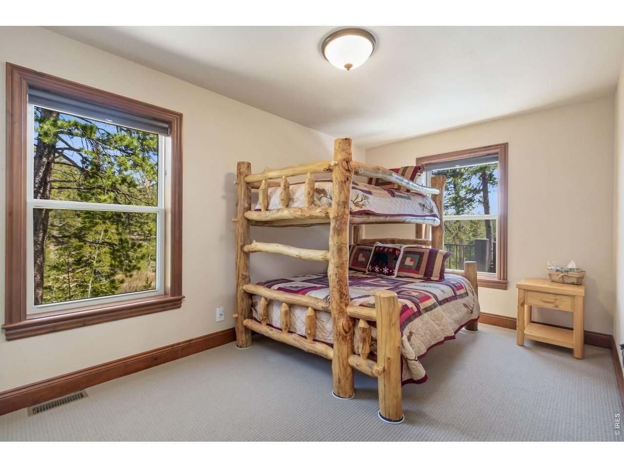 One of the 2 bedrooms on the main level, which share a full bathroom! Large closet and more great views!