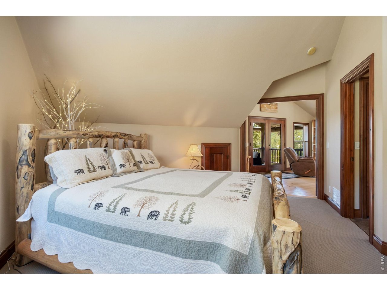Primary bedroom with views to the loft