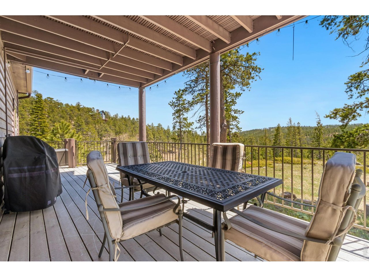Massive wrap-around deck! The south side is covered and all set up to BBQ (plumbed from the house) and eat outdoors!