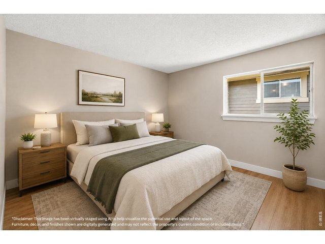 Property Photo 13 Virtually staged, spacious bedroom