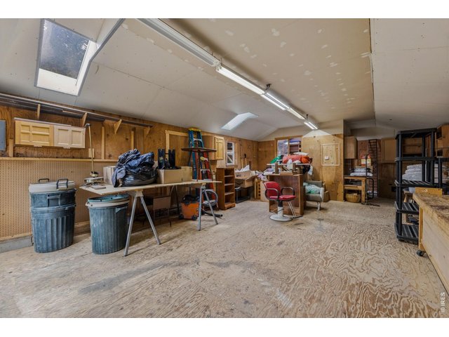 Property Photo 26 Large with skylights, electricity, and small office space in back 