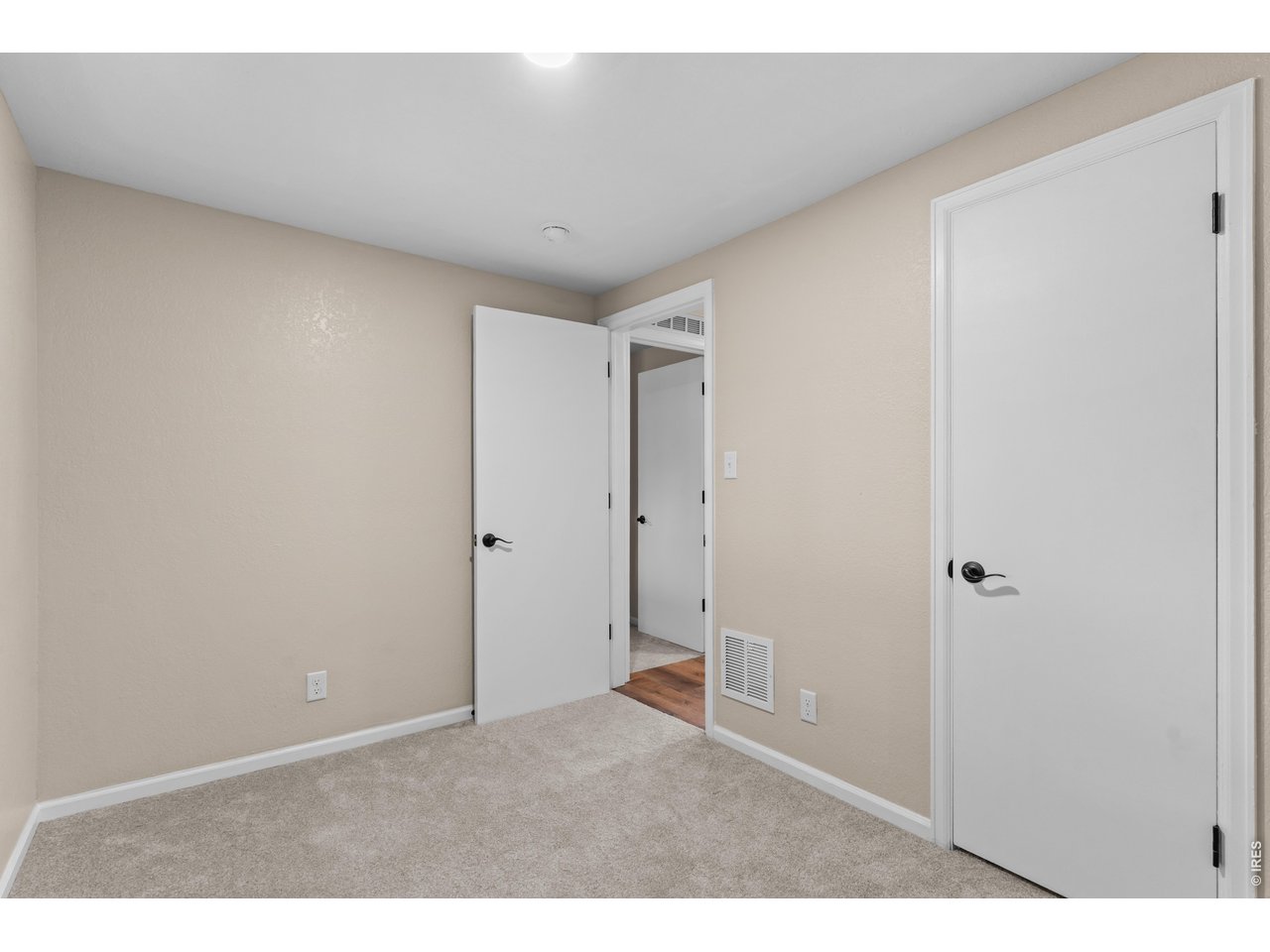 3rd Bedroom with new carpet and light.