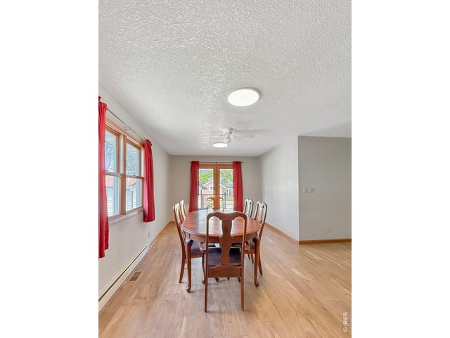 Property Photo 13 Dining Area with Patio Access