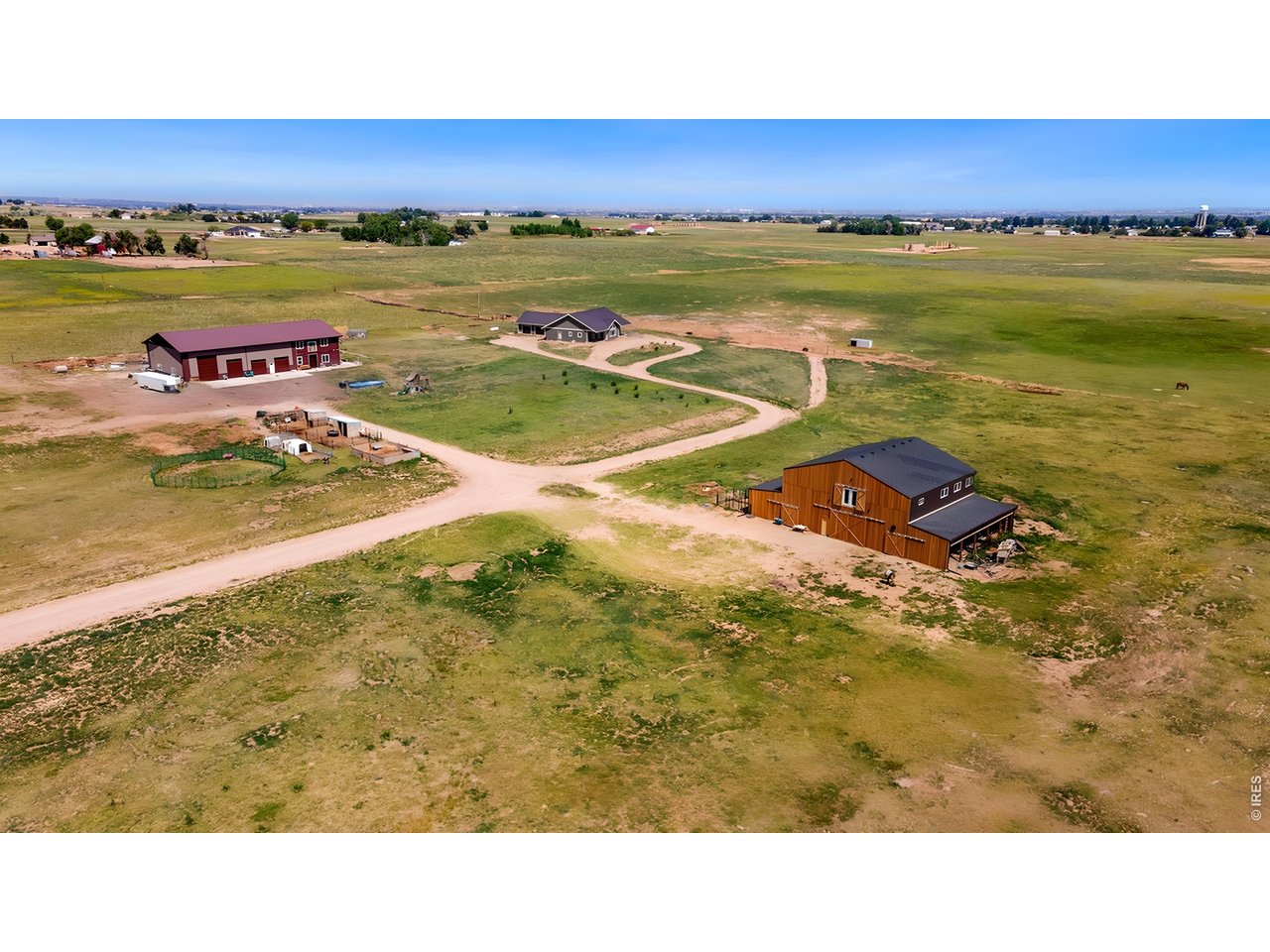 Two dwellings, a barn, and room to roam!