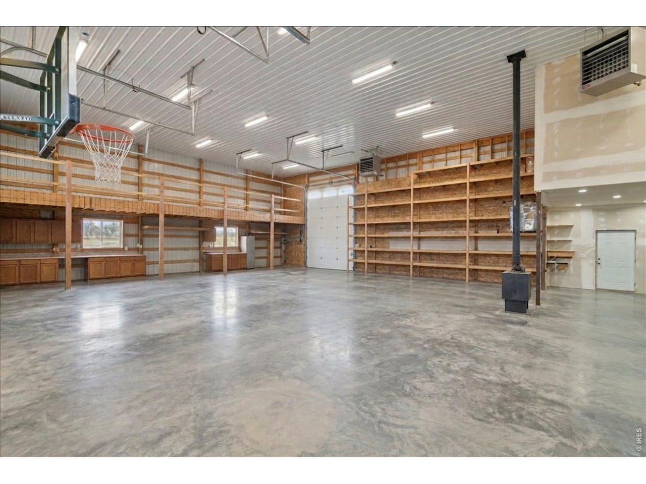 3,600 sqft attached heated shop with pass-through doors