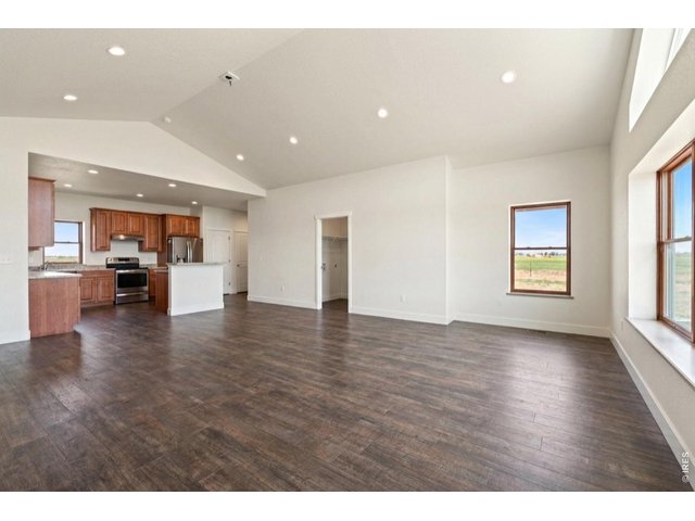 Property Photo 21 Spacious living room (Furnishings removed with AI)